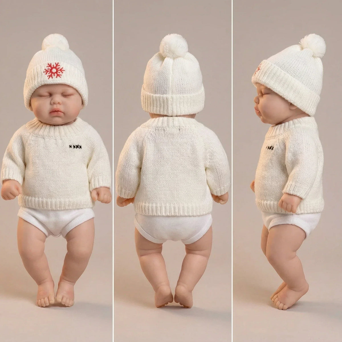 30 cm Reborn-Puppe Pickle aus Vollsilikon mit geschlossenen Augen im weißen Pullover