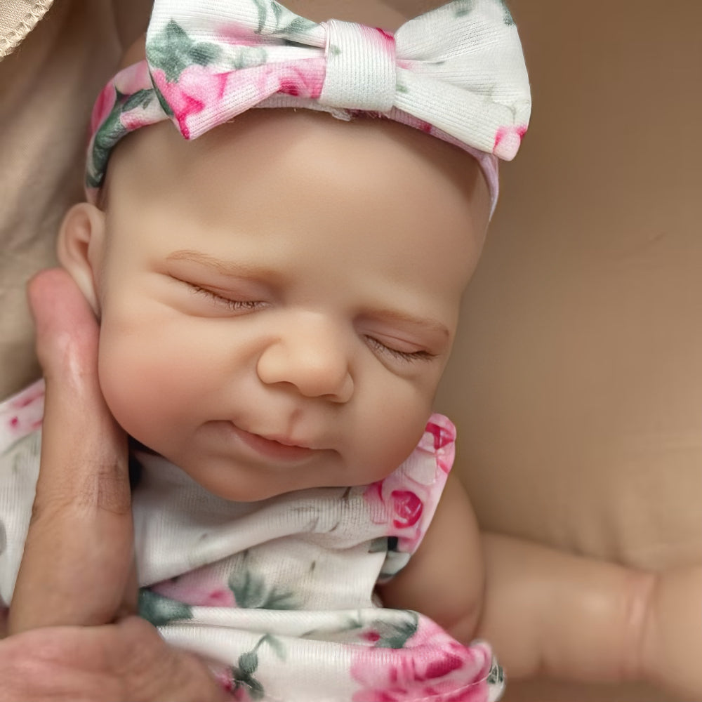 30 cm niedliche Pascale Reborn Puppe aus Vollsilikon in rosa geblümtem Outfit