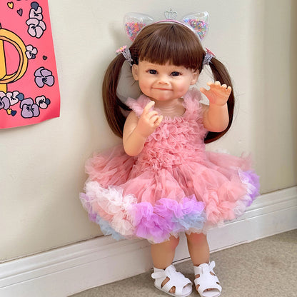 55 cm Raya Reborn-Puppe mit langen Haaren im rosa Kleid