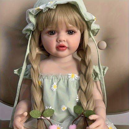 55 cm rebornte Baby-Dame Betty mit offenen Augen und langen blonden Haaren in grünem Gänseblümchen-Outfit