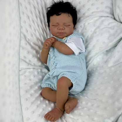 48cm lebensechte Reborn-Puppe Pascale mit weichem Körper dunkler Haut und geschlossenen Augen
