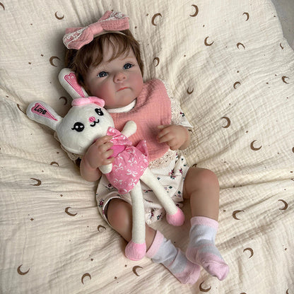 45 cm lebensechte Vinyl-Babypuppe Bettie mit kurzem Haar in geblümten Outfits
