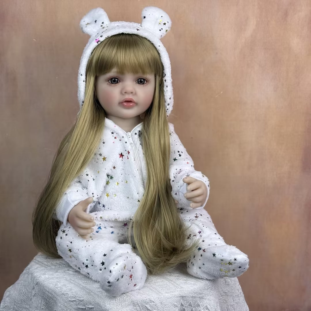 55 cm rebornte Baby-Dame Betty mit offenen Augen und langen blonden Haaren im Sternen-Jumpsuit