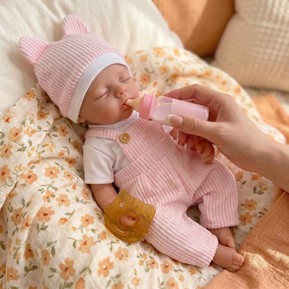 30 cm realistische Irys Reborn Puppe Mädchen aus Vollsilikon in rosa Outfits