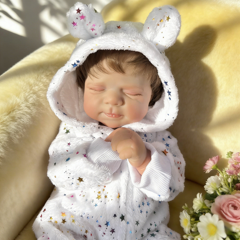 48 cm realistische Pascale Reborn-Babypuppe mit geschlossenen Augen im Sternen-Jumpsuit