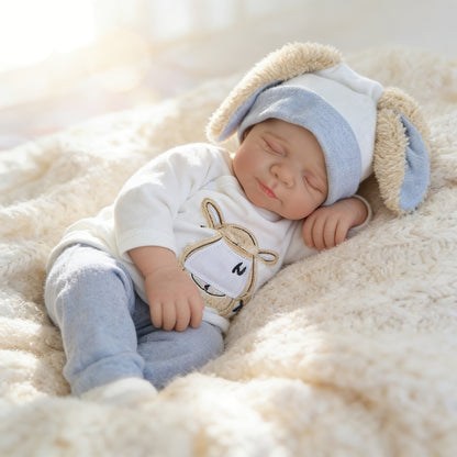 48 cm lebensechte handbemalte Reborn-Babypuppe Pascale mit geschlossenen Augen.