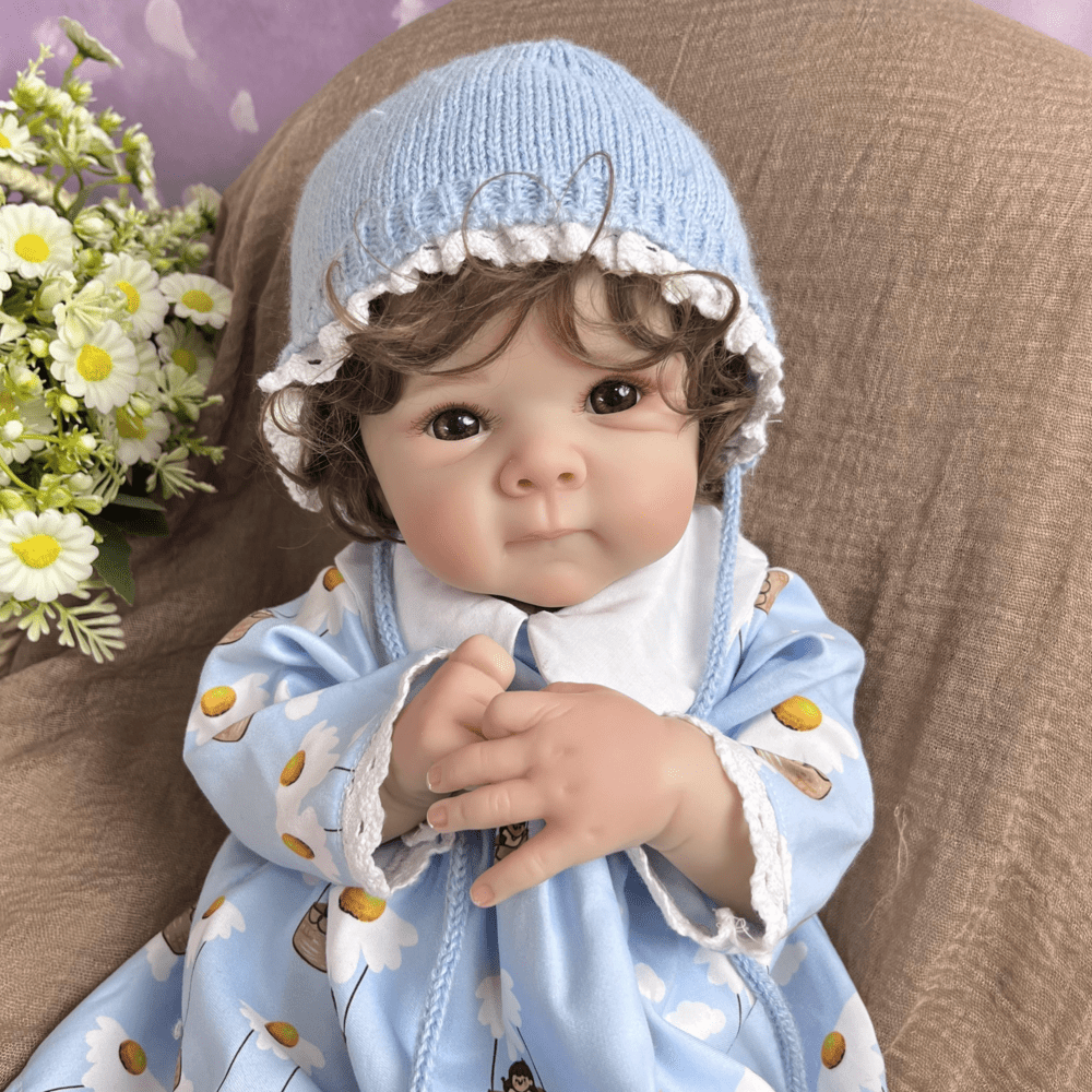 45 cm lebensechte Bettie Reborn-Babypuppe mit kurzem Haar in blauer Kleidung