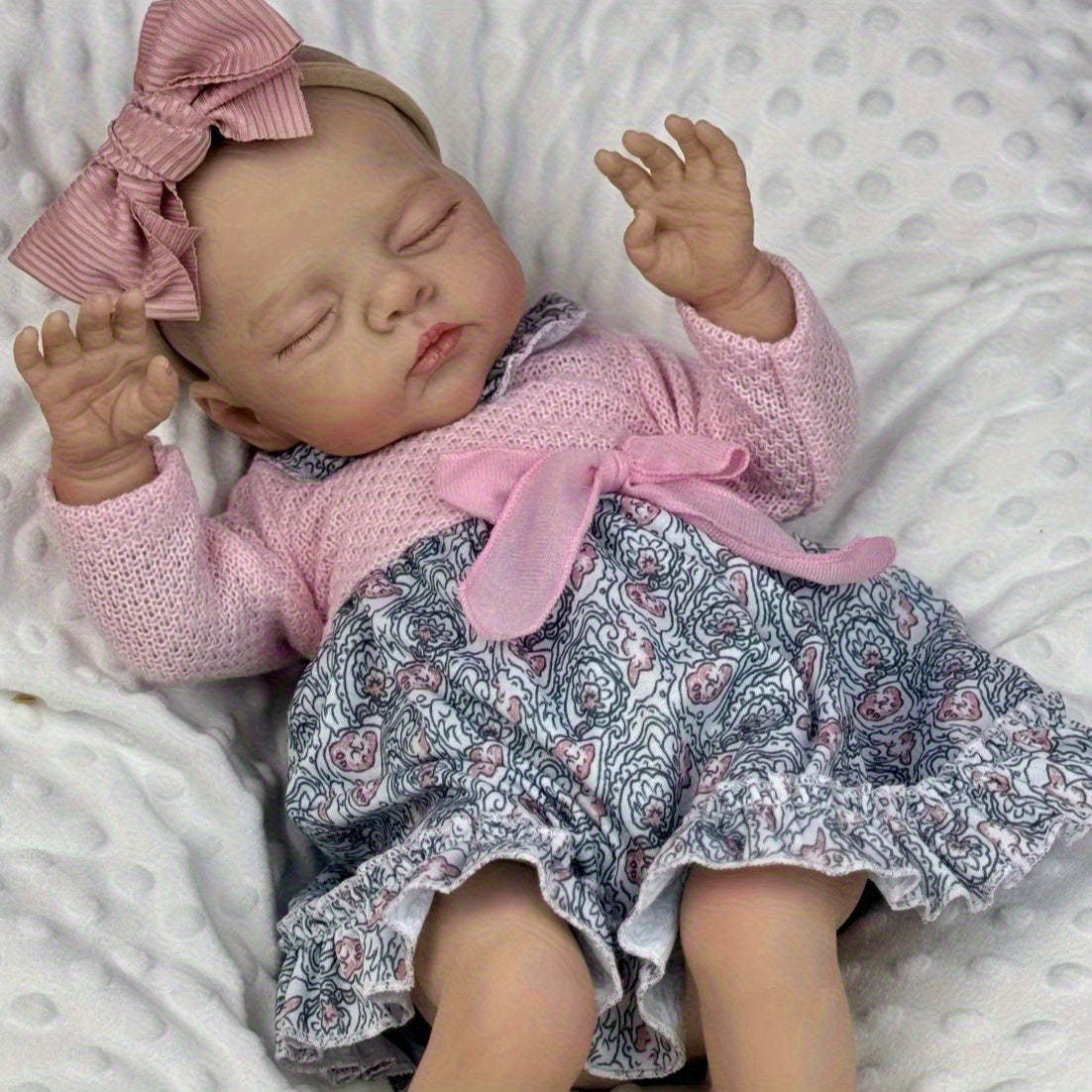 19 Zoll weiche schlafende Irys Reborn Puppe im rosa Blumenkleid