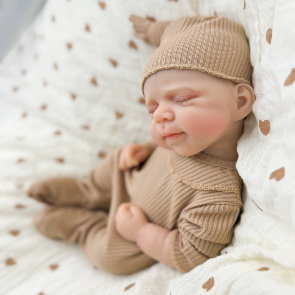 30 cm schlafende Pascale Reborn-Puppe aus Vollsilikon in brauner Kleidung