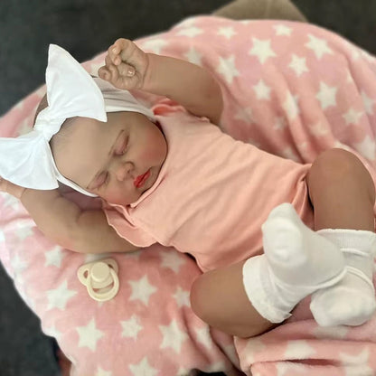 60 cm Pickle Reborn-Puppe mit geschlossenen Augen in rosa Kleidung