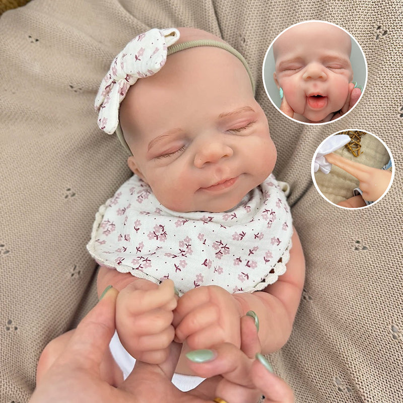 45cm dehnbares schlafendes Pascale Reborn Baby aus Vollsilikon mit Lätzchen mit Blumenmuster