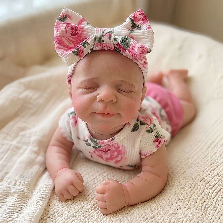 30 cm niedliche Pascale Reborn Puppe aus Vollsilikon in rosa geblümtem Outfit