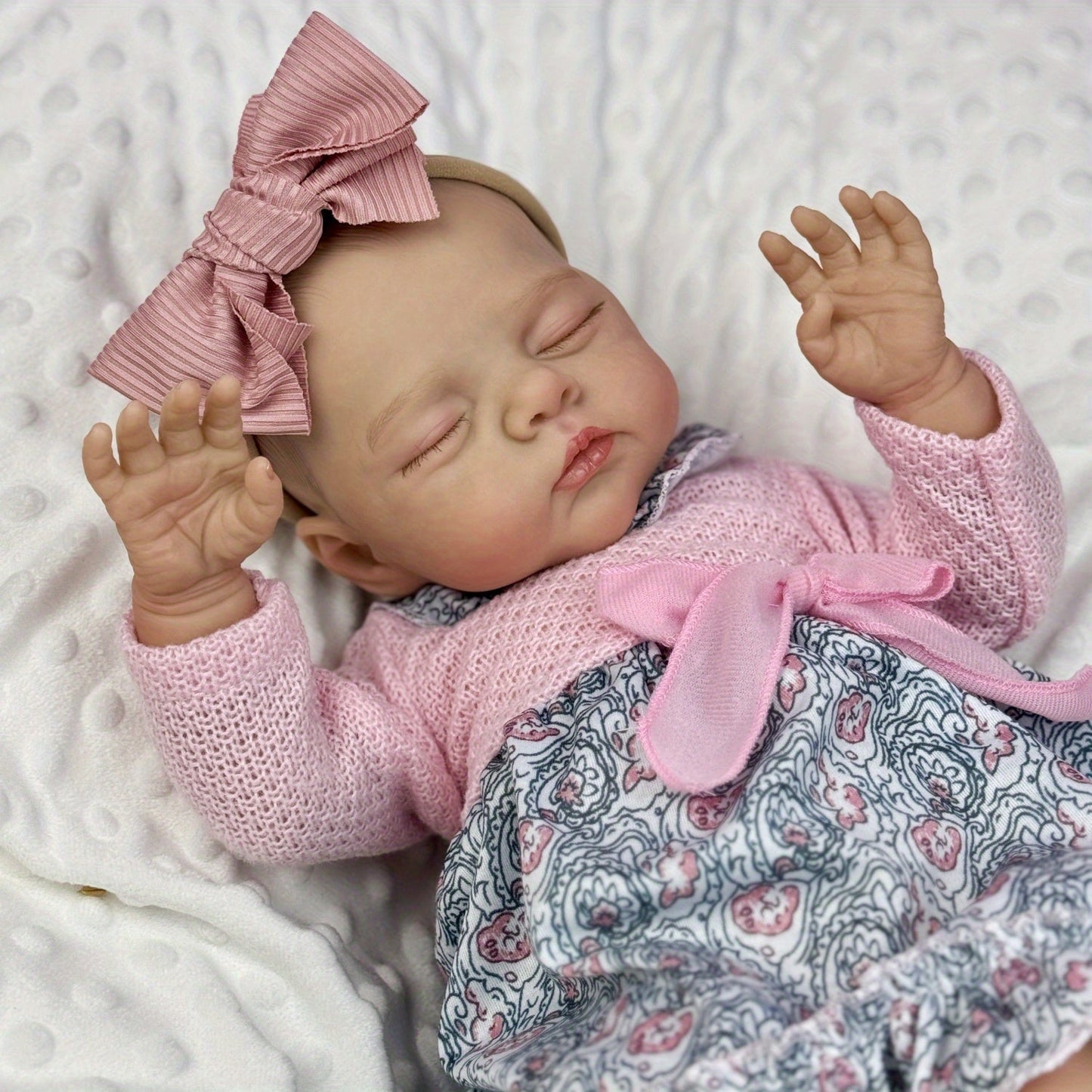 19 Zoll weiche schlafende Irys Reborn Puppe im rosa Blumenkleid