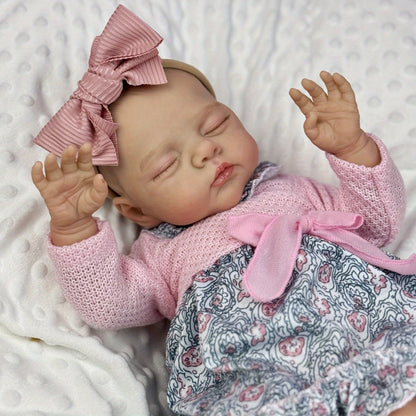 19 Zoll weiche schlafende Irys Reborn Puppe im rosa Blumenkleid