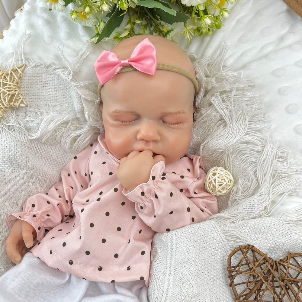 45 cm dehnbare Loulou Reborn Puppe aus Vollsilikon schlafend in rosa gepunktetem Outfit