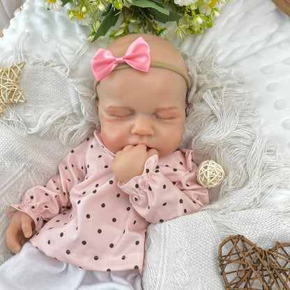 45 cm dehnbare Loulou Reborn Puppe aus Vollsilikon schlafend in rosa gepunktetem Outfit