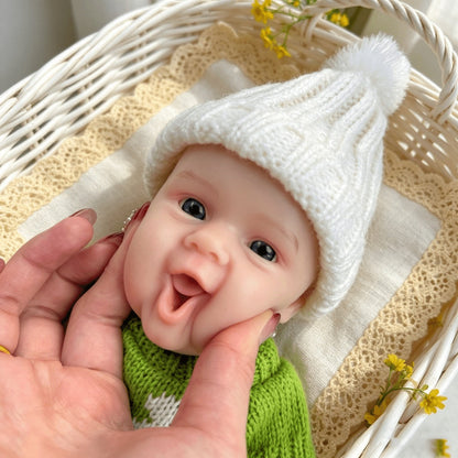30 cm vollständig aus Silikon gefertigte Reborn Babypuppe Maddie lächeln in grünen Outfits