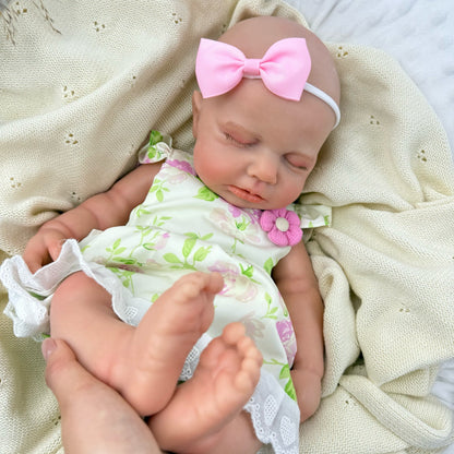 45 cm dehnbare Loulou-Reborn Puppe aus Vollsilikon im Blumenkleid