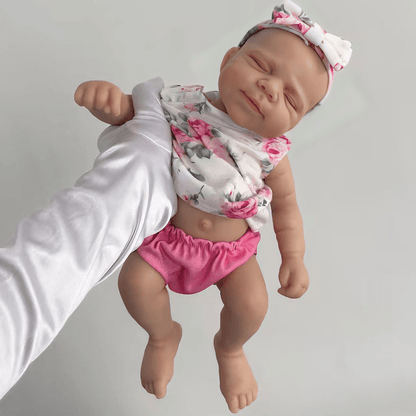 30 cm niedliche Pascale Reborn Puppe aus Vollsilikon in rosa geblümtem Outfit