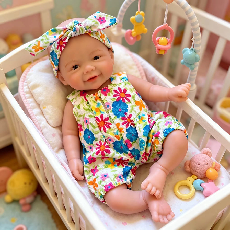 20cm Mini Reborn Baby Vivienne (Mädchen) aus Vollsilikon im geblümten Jumpsuit