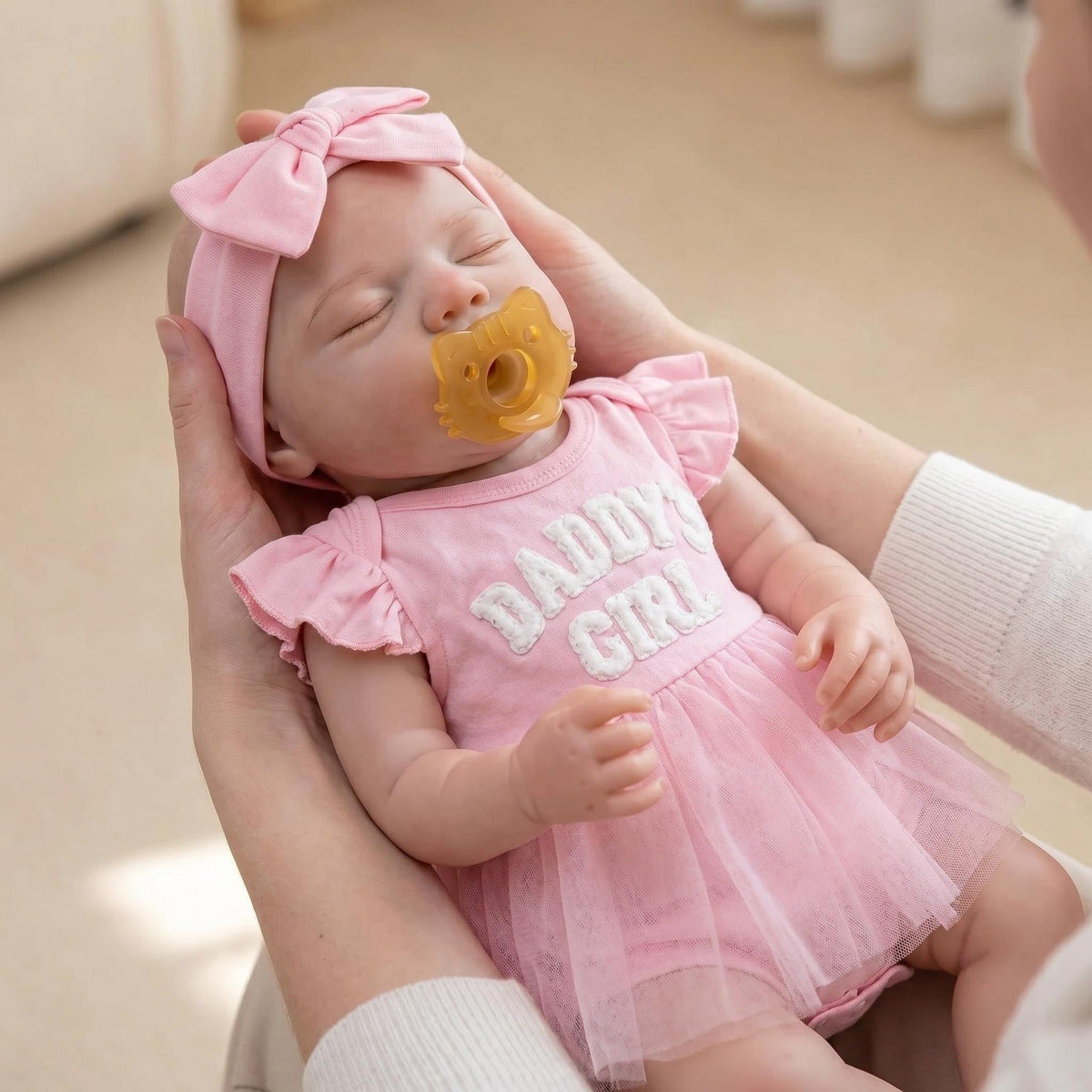 45 cm realistische Pascale Reborn Puppe aus Vollsilikon im rosa Kleid