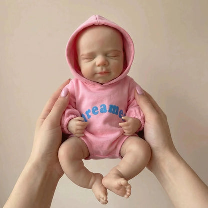 30 cm Pascale Reborn Puppe aus Vollsilikon in rosa Outfits
