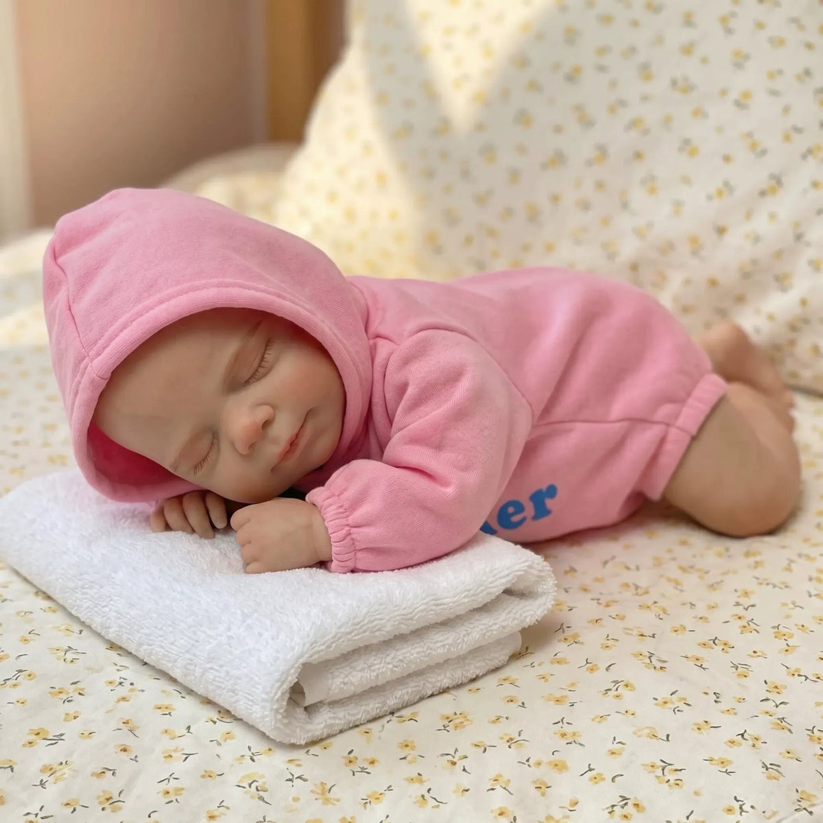 30 cm Pascale Reborn Puppe aus Vollsilikon in rosa Outfits