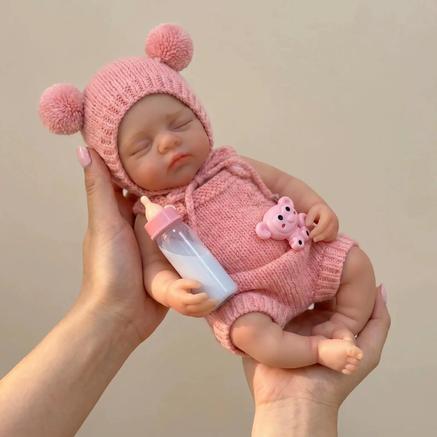 30 cm Irys Reborn Puppe aus Vollsilikon Mädchen in rosa Outfits