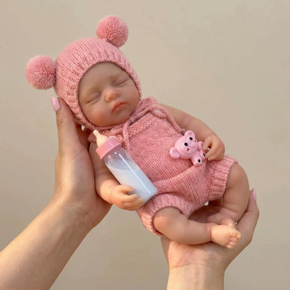 30 cm Irys Reborn Puppe aus Vollsilikon Mädchen in rosa Outfits