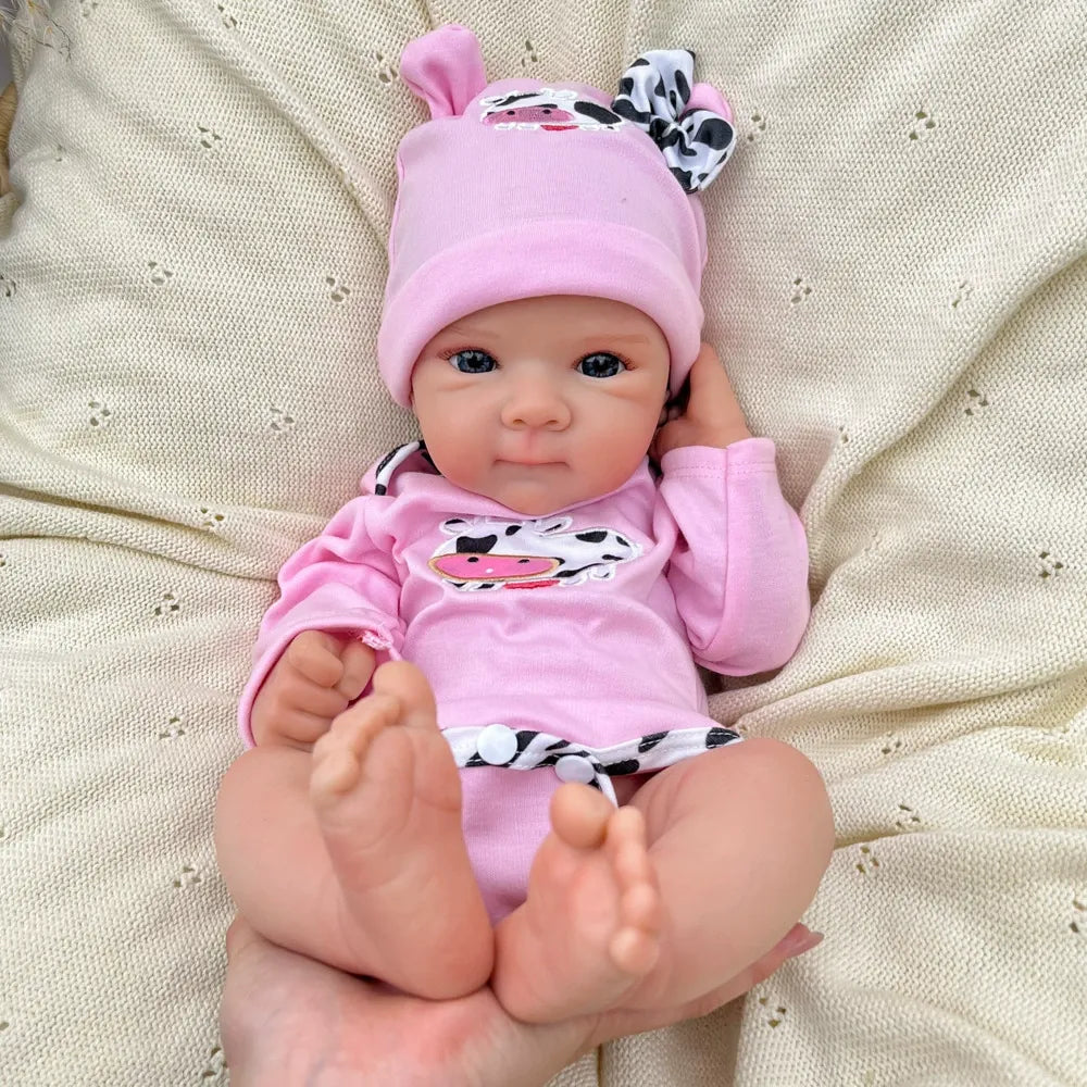 45 cm lebensechte Bettie Reborn Puppe aus Vollsilikon in rosa Outfits