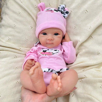 45 cm lebensechte Bettie Reborn Puppe aus Vollsilikon in rosa Outfits