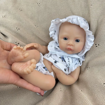30 cm vollständig aus Silikon gefertigtes Reborn Baby Meadow Mädchen in weißer Blumenkleidung