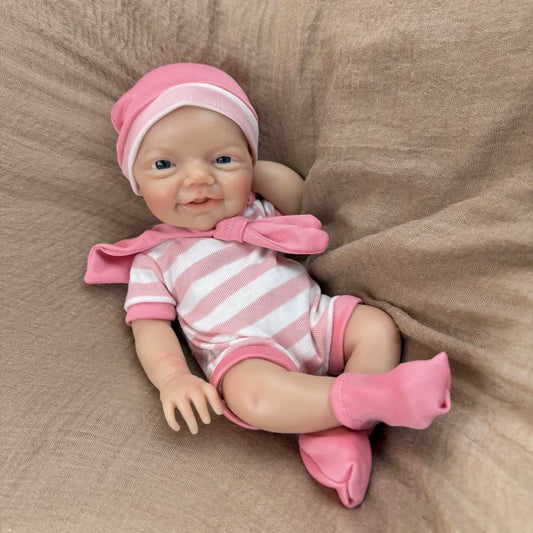 30 cm lebensechtes Lächeln Vollsilikon blaue Augen Charlie Reborn-Mädchen in rosa gestreifter Kleidung
