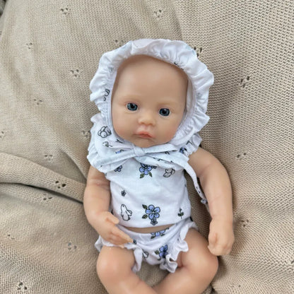 30 cm vollständig aus Silikon gefertigtes Reborn Baby Meadow Mädchen in weißer Blumenkleidung