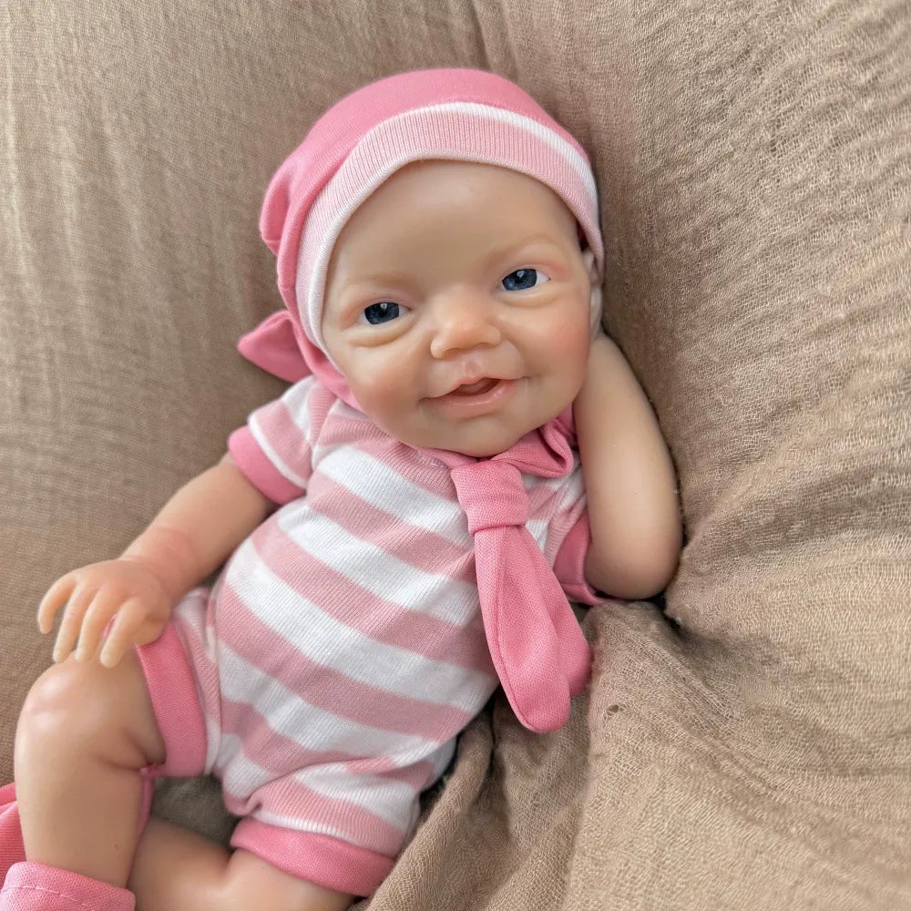 30 cm lebensechtes Lächeln Vollsilikon blaue Augen Charlie Reborn-Mädchen in rosa gestreifter Kleidung