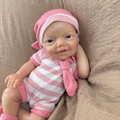 30 cm lebensechtes Lächeln Vollsilikon blaue Augen Charlie Reborn-Mädchen in rosa gestreifter Kleidung