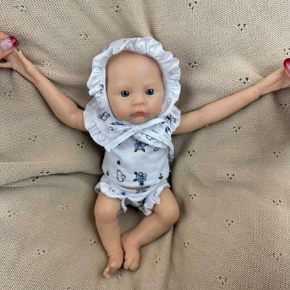 30 cm vollständig aus Silikon gefertigtes Reborn Baby Meadow Mädchen in weißer Blumenkleidung