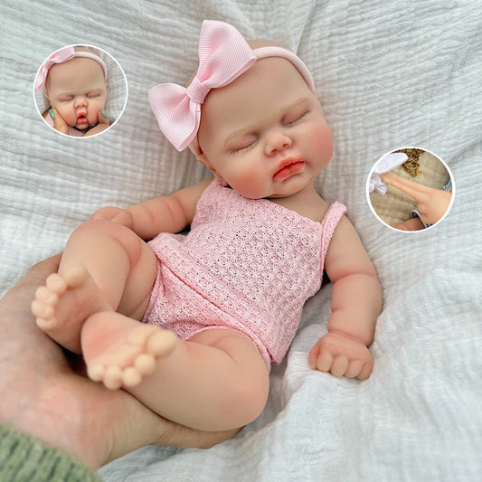 30 cm vollständig aus Silikon gefertigte Reborn Puppe Pickle mit geschlossenen Augen in rosa Outfits