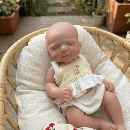 20cm Mini Reborn Baby Pascale aus Silikon mit geschlossenen Augen in gelbem Outfit