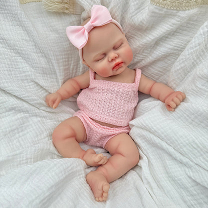 30 cm vollständig aus Silikon gefertigte Reborn Puppe Pickle mit geschlossenen Augen in rosa Outfits