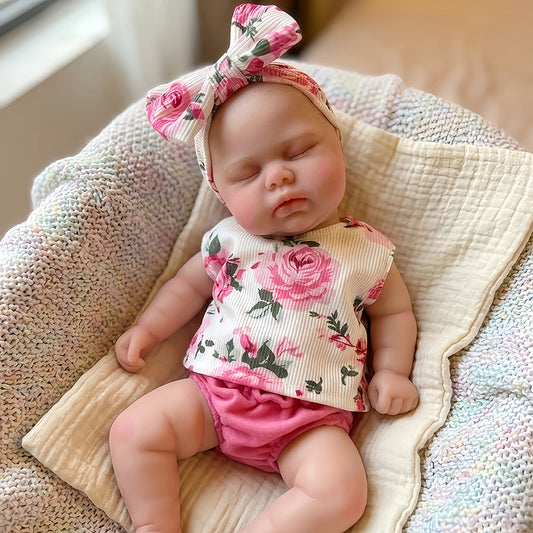 30cm Pickle Reborn Puppe aus Vollsilikon mit geschlossenen Augen im geblümten Outfit