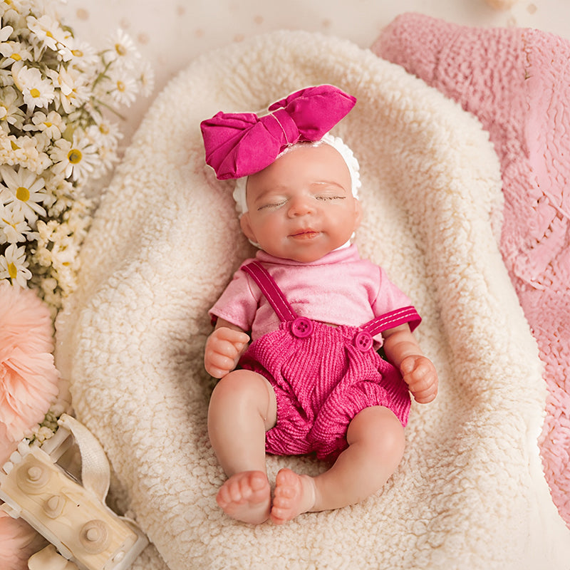 20cm Mini Reborn Baby Pascale aus Silikon mit geschlossenen Augen in rosafarbenem Outfit