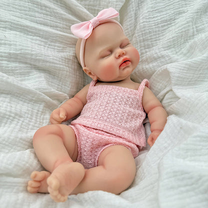 30 cm vollständig aus Silikon gefertigte Reborn Puppe Pickle mit geschlossenen Augen in rosa Outfits