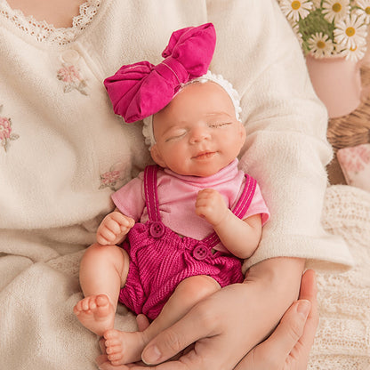 20cm Mini Reborn Baby Pascale aus Silikon mit geschlossenen Augen in rosafarbenem Outfit