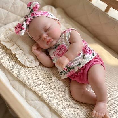 30cm Pickle Reborn Puppe aus Vollsilikon mit geschlossenen Augen im geblümten Outfit
