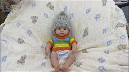 30 cm vollständig aus Silikon gefertigtes Reborn Baby Meadow Mädchen im bunten Streifenpullover