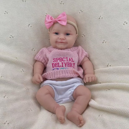 30 cm vollständig aus Silikon gefertigtes Reborn Baby Maddies Lächeln in rosa Outfits