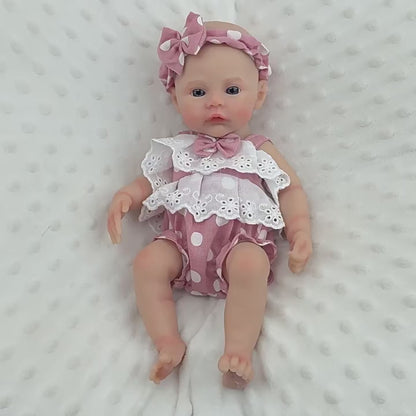 30 cm vollständig aus Silikon gefertigtes Reborn-Baby Meadow Mädchen mit rosa gepunkteter Kleidung