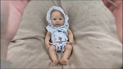 30 cm vollständig aus Silikon gefertigtes Reborn Baby Meadow Mädchen in weißer Blumenkleidung