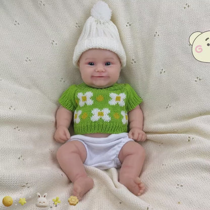 30 cm vollständig aus Silikon gefertigte Reborn Babypuppe Maddie lächeln in grünen Outfits